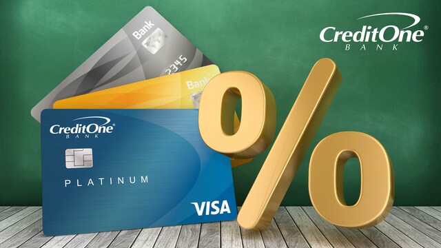 A selection of credit cards with a large percentage sign represents how credit card interest rates work.