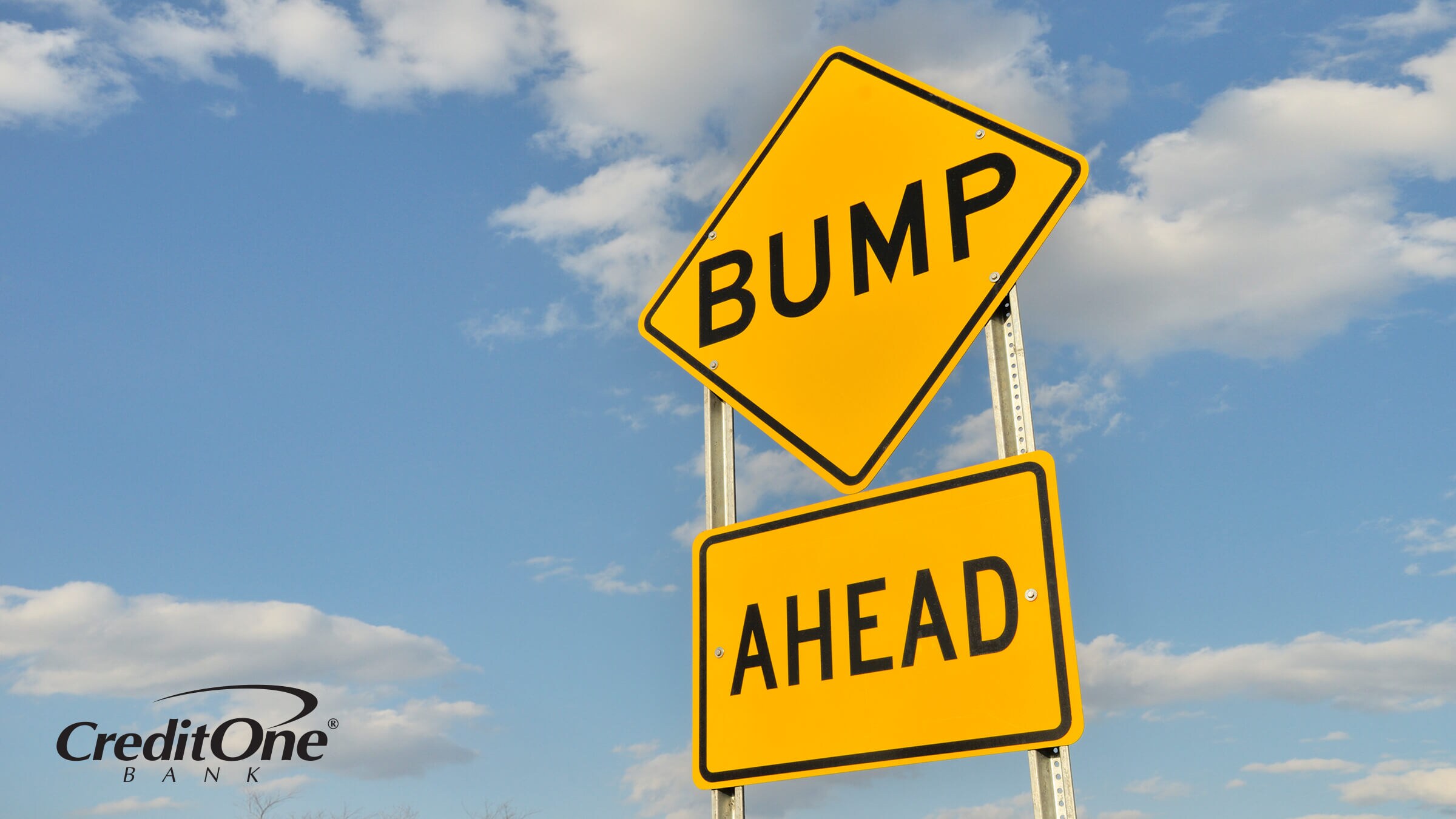 A photo of a bump ahead road sign