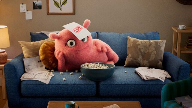 Credit Wrecker: Miss Payment lounging on the couch